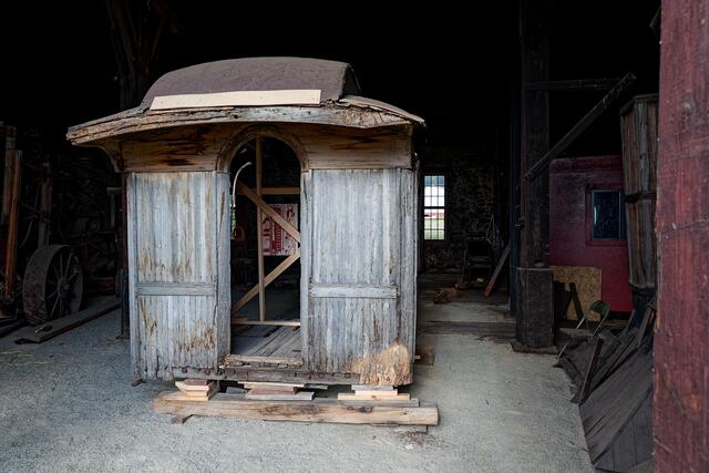 Old Car Sitting In A Stall print