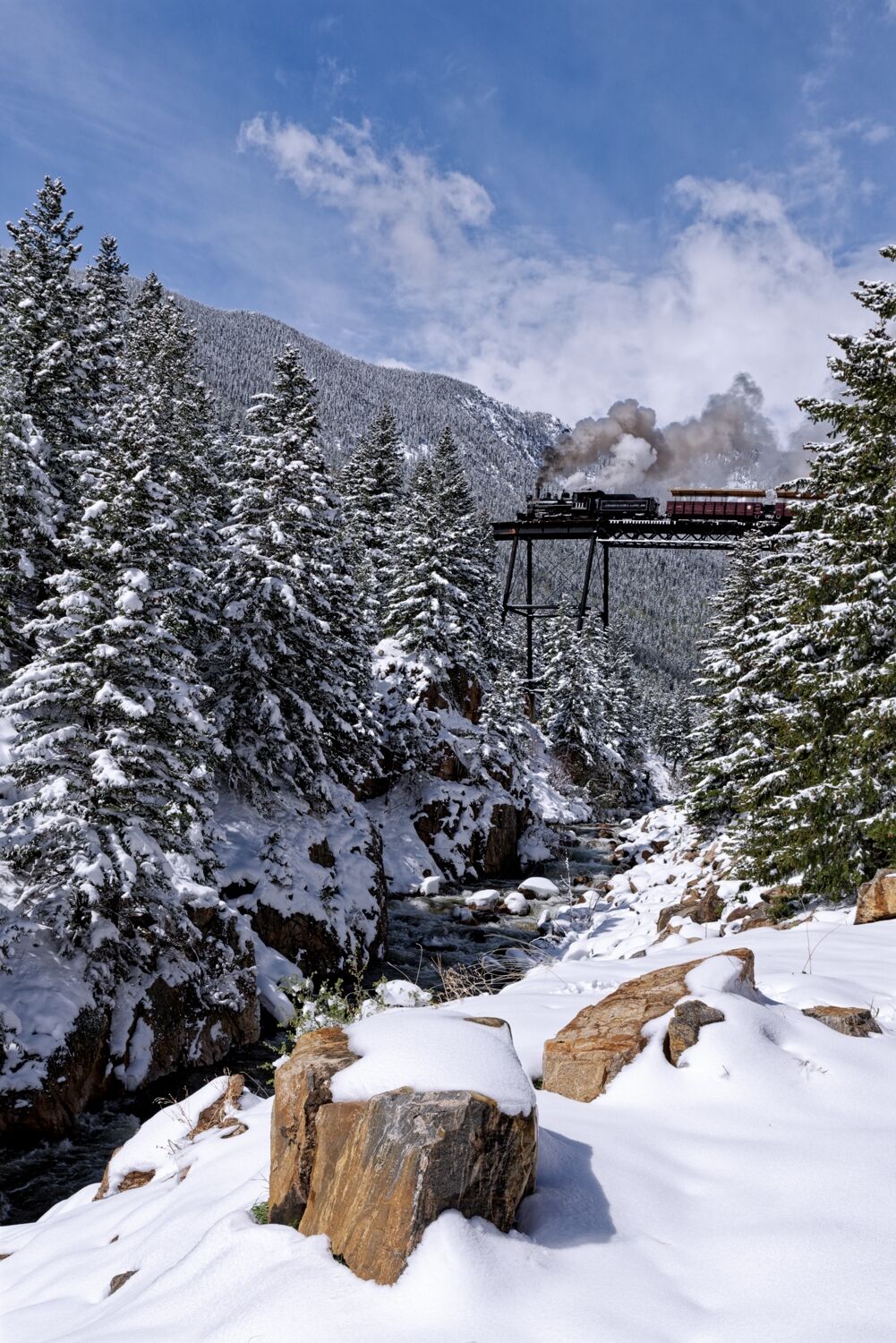 First train out headed to Silver Plume Colorado crossing Devils Gate Bridge. A heavy wet spring snow overnight a week before...