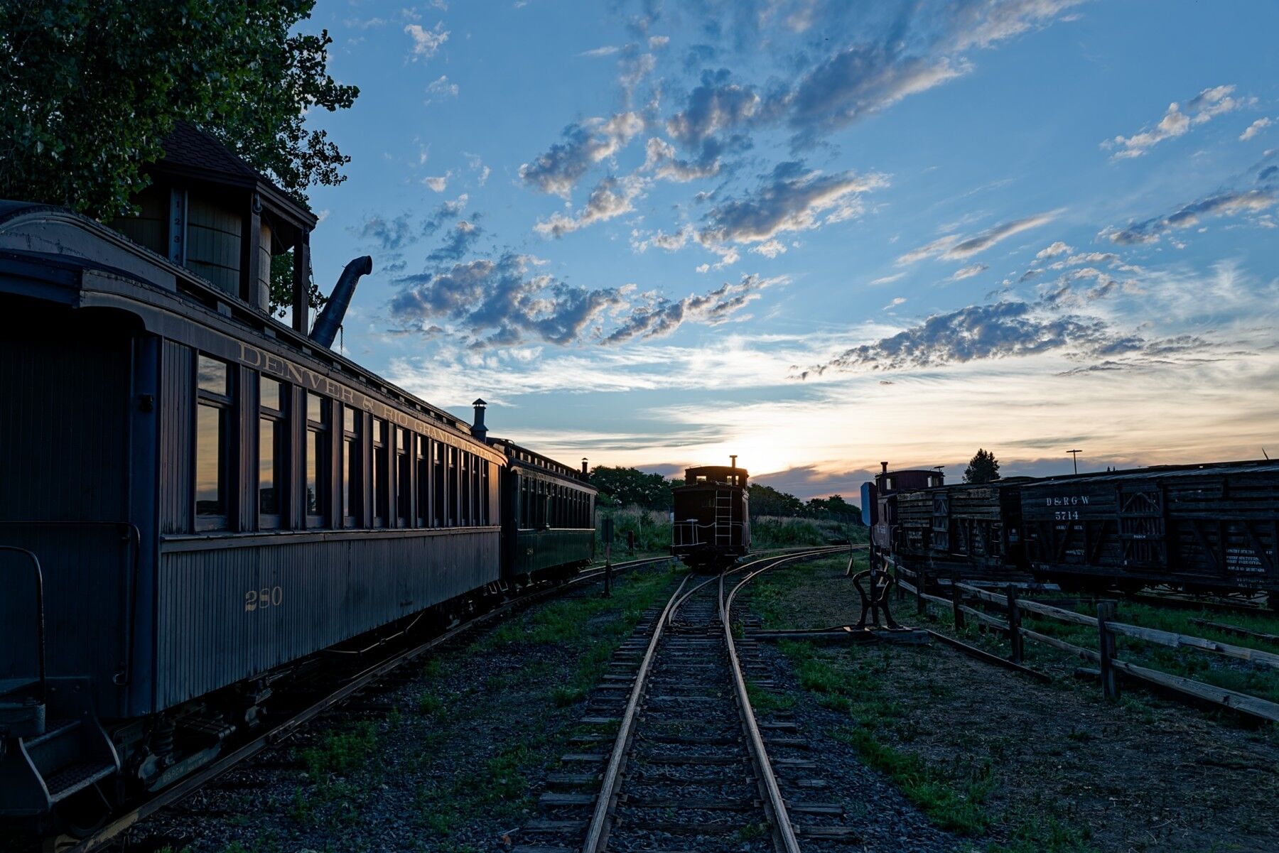 Sunrise at the Colorado Railroad Museum in Golden Colorado with a glowing caboose. What a morning.