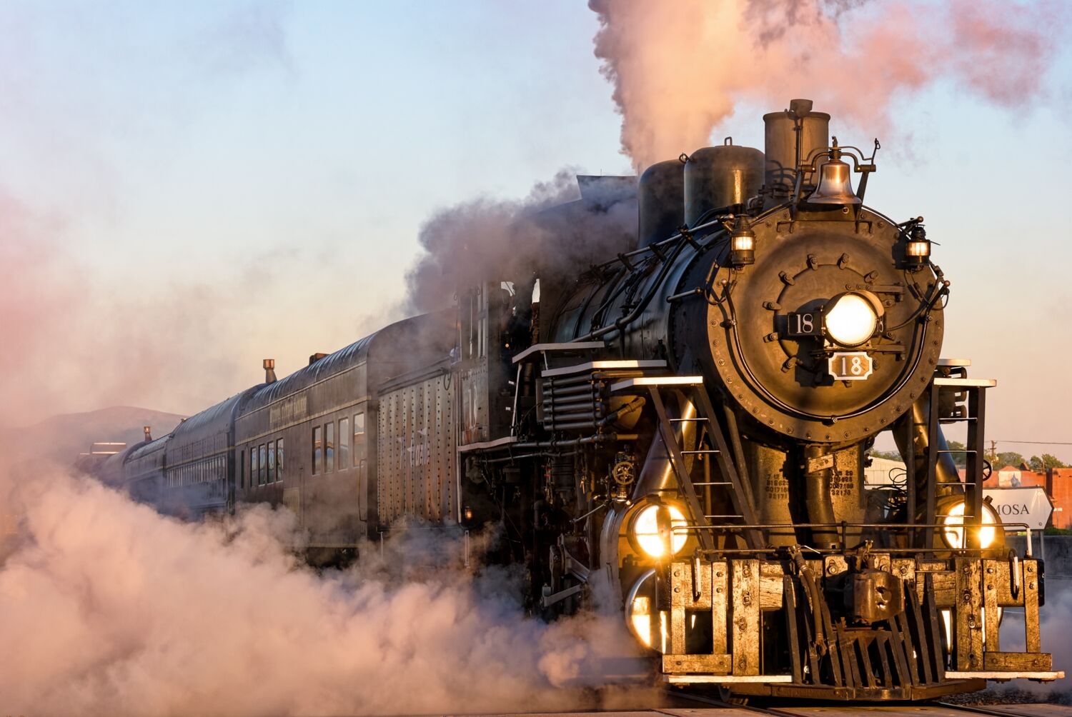 Ex Grand Canyon Railway number 18 lettered for the Rio Grande Railroad puts on a spectacular show of force at sunrise in Alamosa...