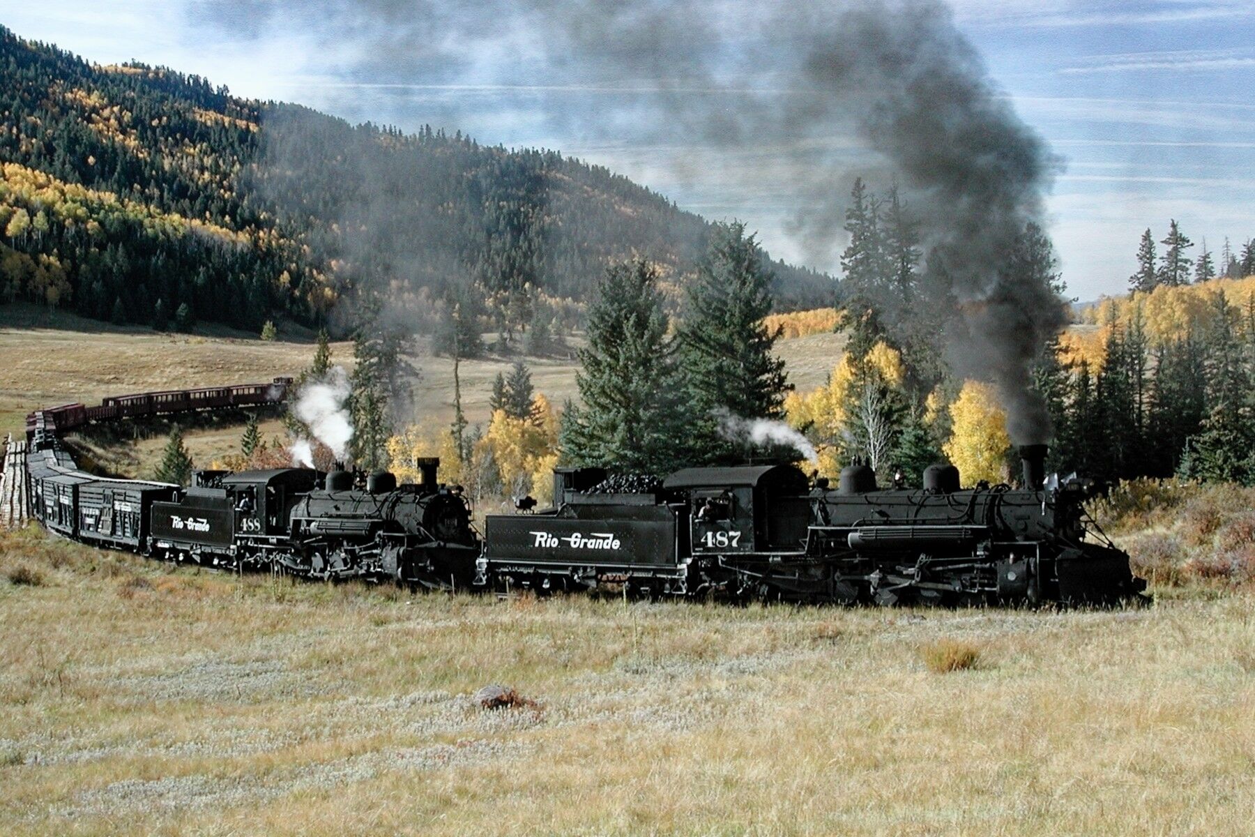 A double header narrow gauge freight  working its way to the top of Cumbres Pass at La Bato trestle. Taken at the Cumbres & Toltec...