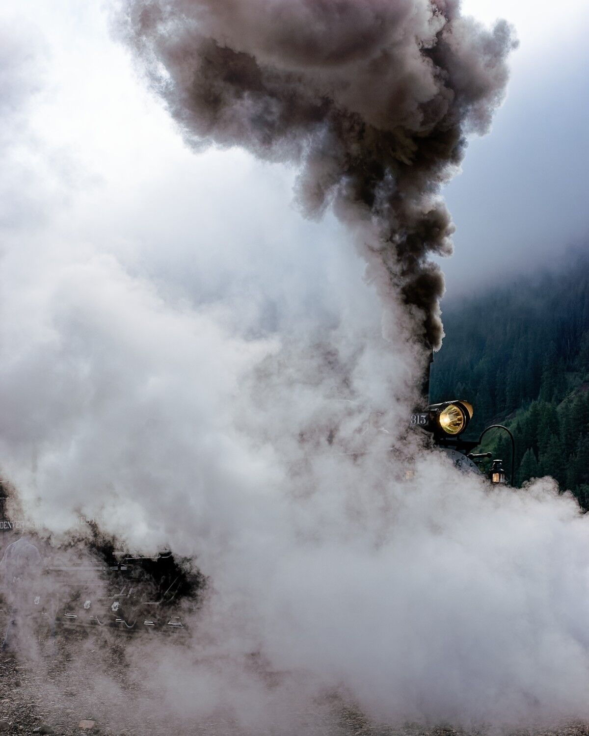 Just A Headlight Only just a headlight through the steam.