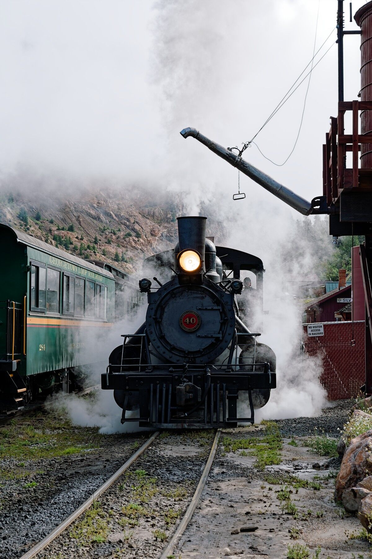 Next Stop Water Tank Georgetown loop 111 stopping at the water tank for a much needed drink of water. Silver Plume yard.