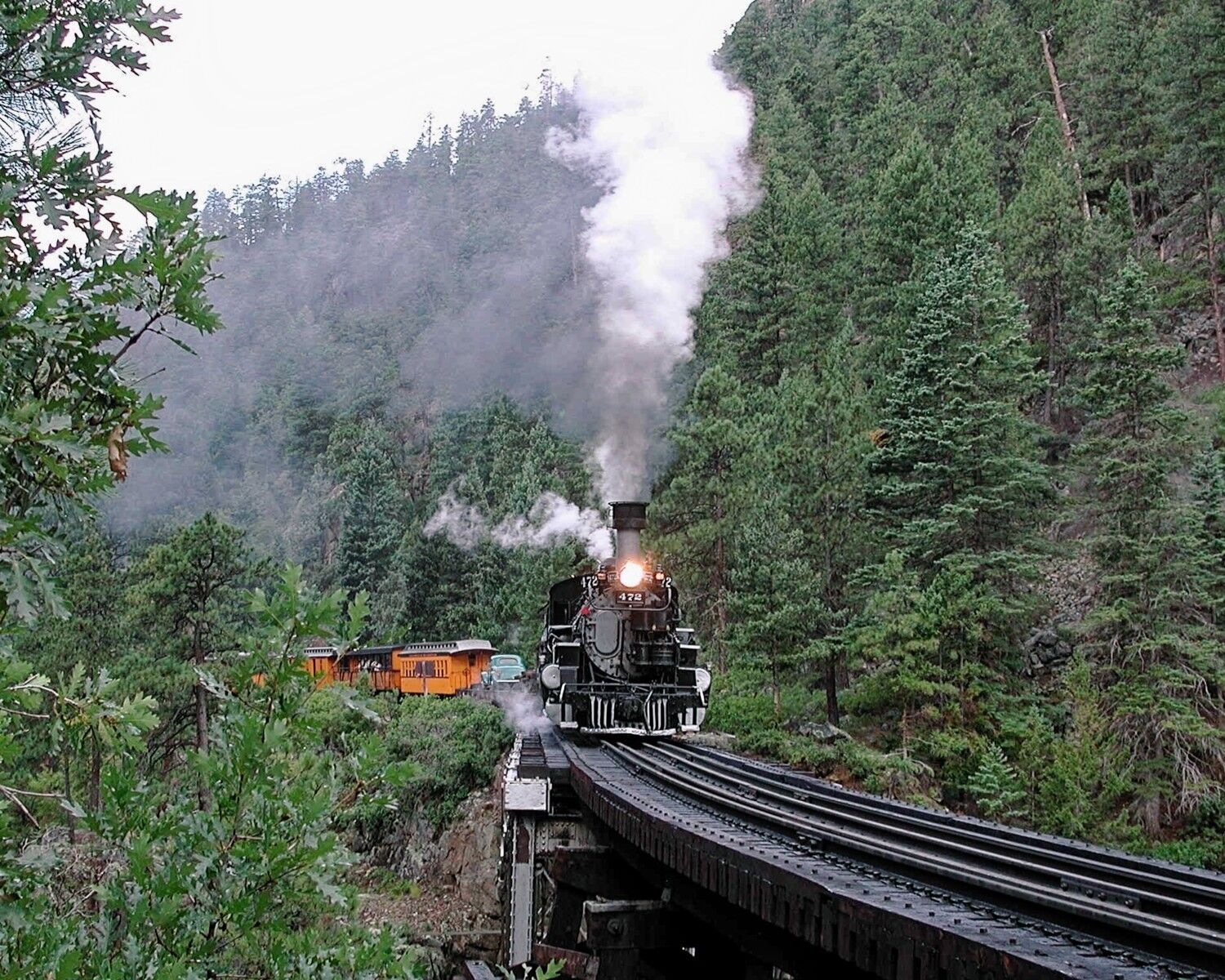 Running Proud At High Bridge 472 crosses the High Bridge with a narrow gauge mixed train and looking proud.