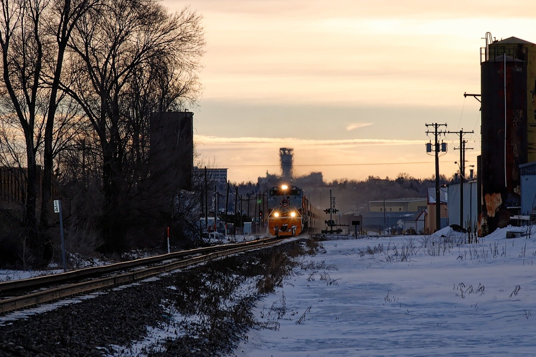 Ski Train Pops Into View Winter Park Ski Train pops into view at sunrise as it goes through Arvada Colorado on the way to Winter Park Ski Area.
