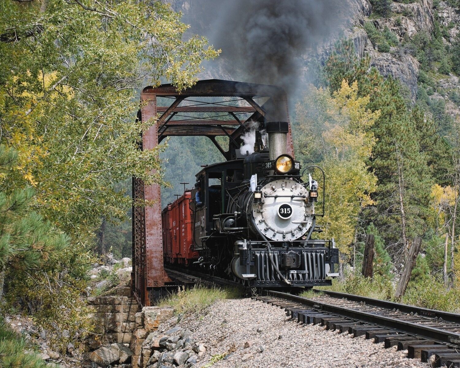 Denver Rio Grande 315 crosses teft bridge near Cascade on the Durango Silverton.