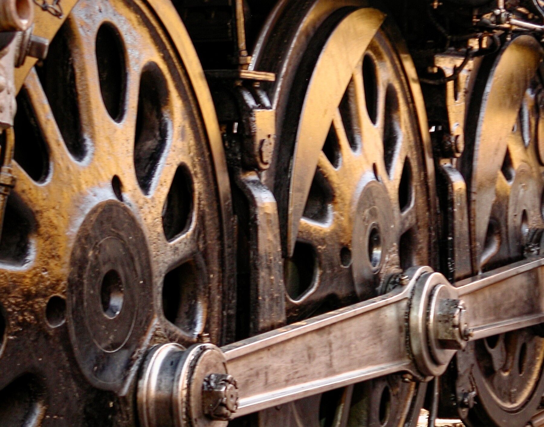 Wheels with lots of color. These huge set of wheels are the drive wheels on Union Pacific steam locomotive 844. The reflecting...